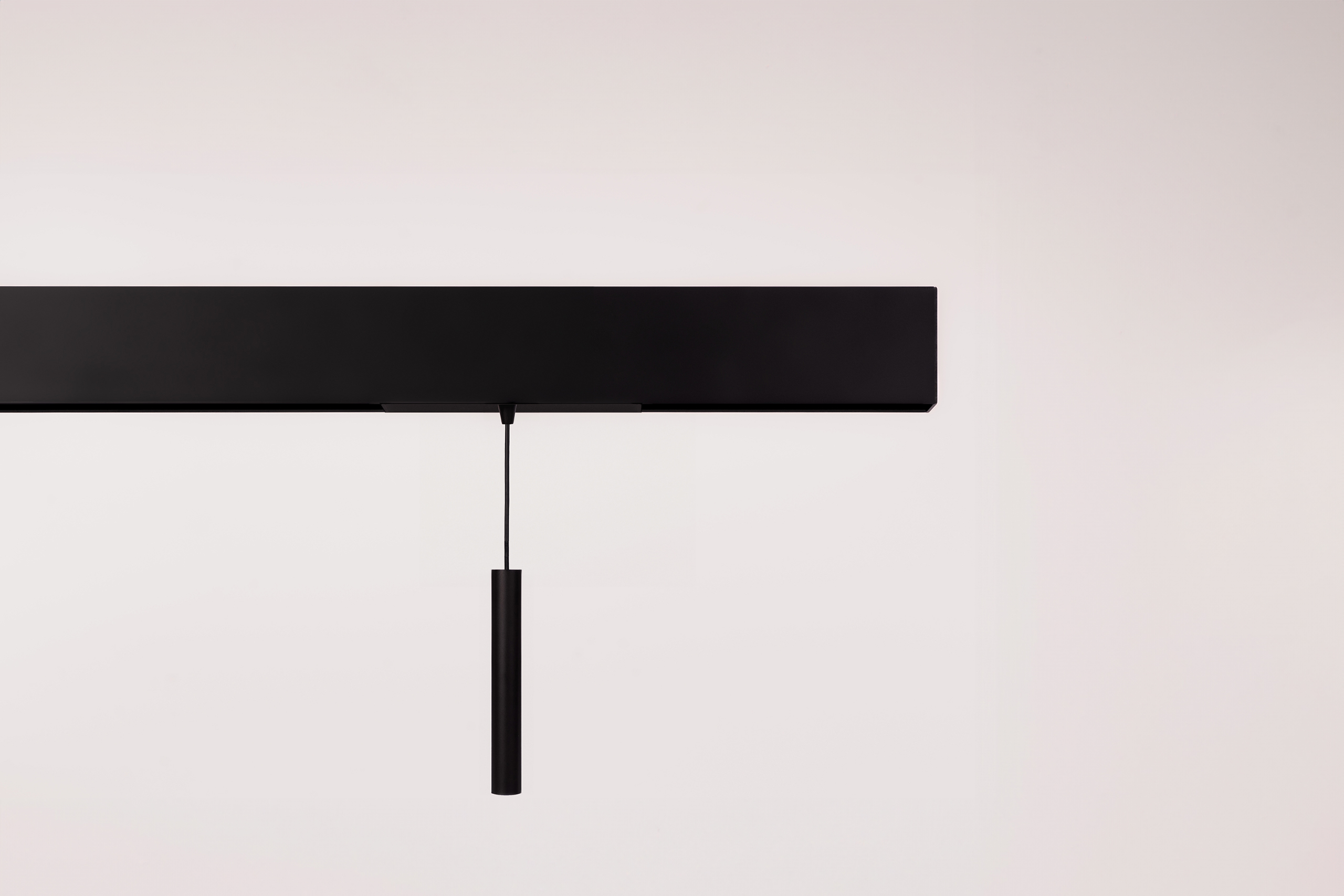 magnetic track system LED matt black module with a hanging tube pendant with adjustable cord