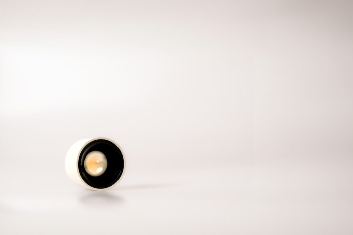 Matt white cylinder-shaped downlight and spotlight with crystal lens