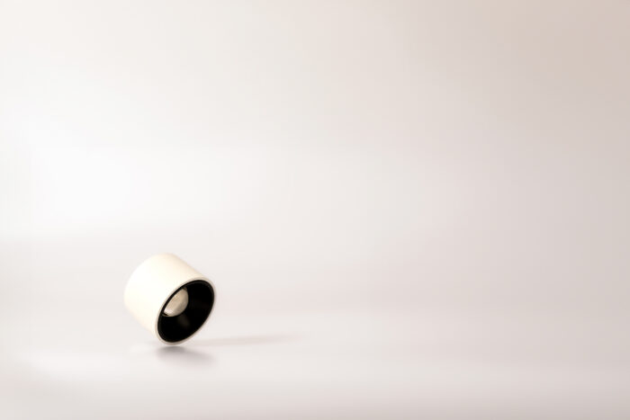 Matt white cylinder-shaped downlight and spotlight with crystal lens