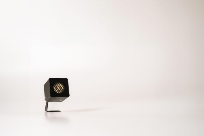 small square black exterior spotlight with honeycomb lens